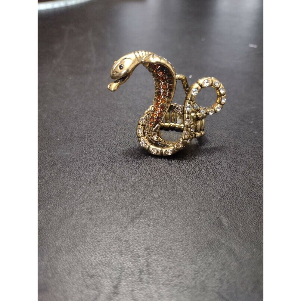 Gold tone rhinestone snake ring